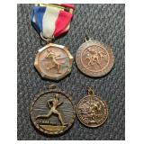 4 vintage metal awards.
