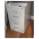 Metal filing cabinet.