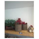 Shelf lot of Christmas decor.