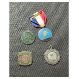 4 vintage metal awards.