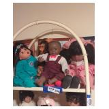 Big lot of dolls, shelving units not included.