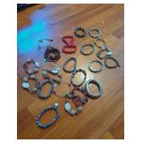 Assorted Beaded and Metal Bracelets Collection.