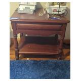 Nightstand with drawer.