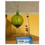 Green Glass Vase and Galileo Thermometer