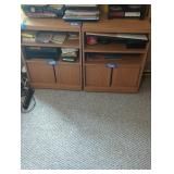 Pair of wooden book shelves with doors on the