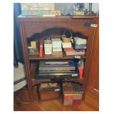Book shelf. Items on and in bookshelf not