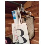 Bags, hangers and a cardboard Tube