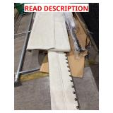 Cream upholstered bed frame with brass nailhead