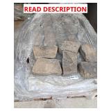 Skid of flagstone blocks