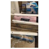 Skid Of Lights And Roofing Shingles