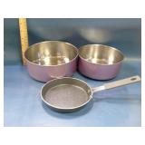 2 metal bowls and 1 small egg skillet