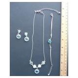 Avon shimmering blue topaz set