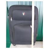 Tucci brand designer luggage on wheels