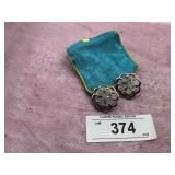 CLIPPED ON EARRINGS