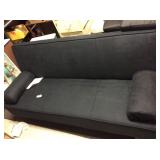 black futon with pillows