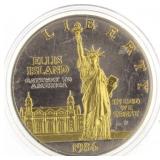 1986 Ellis Island Gold Guilde Silver Dollar