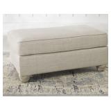 ASHLEY TRAEMORE FARMHOUSE-STYLE OTTOMAN