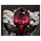 Platinum 6.27 ct Oval Garnet & Diamond ring