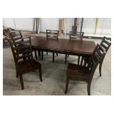 Ashley Table and 6 chairs.   Floor model