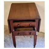 Drop leaf table with two drawers