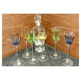 Wine glasses and whiskey canner.