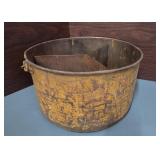 antique or vintage metal container, possibly a