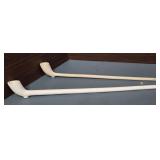 Long-stemmed white clay tobacco pipes, commonly