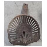vintage cast iron seat, specifically identified