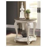Realyn Antique White Round End Table