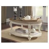 Realyn Antique White Oval Cocktail Table