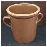 antique stoneware vessel, likely a type of crock