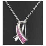 Graduated Pink Topaz Journey Pendant