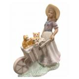 Porcelain Girl Pushing A Cart of Kitty Cats