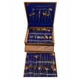 107 pc Gold Tone Silverware in Wood Case