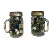 (2) Jars Marbles