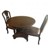 Round Table And Two Chairs