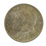 1885-O AU Morgan Silver Dollar