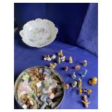 Tim can full of mini porcelain figurines & Bowl