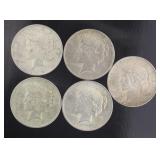Mixed Date Peace Silver Dollar