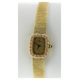 14kt Gold Ladies Baum & Mericier Diamond Watch