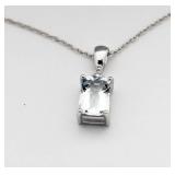 10kt Gold Emerald Cut Blue Topaz & Diamond Pendant