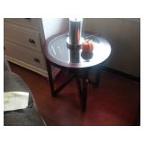 Glass top round accent table. Floor Sample Minor