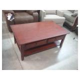 Ashley Cherry 2 drawer coffee table. Minor damage