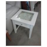 White glass top endtable