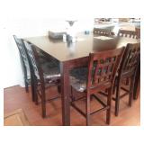 Dark cherry counter height table and 6 barstools