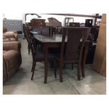 Ashley cherry table and 6 chairs