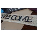 Light metal welcome sign