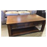 Oak 2 drawer cocktail table on casters