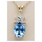 14kt Gold 3.00 ct Blue Topaz & Diamond Pendant