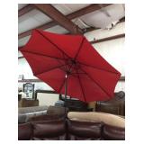 Red tilt patio umbrella. base not included